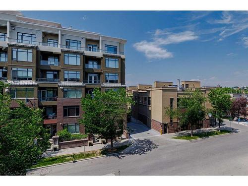 305-1000 Centre Avenue Ne, Calgary, AB - Outdoor With Balcony With Facade