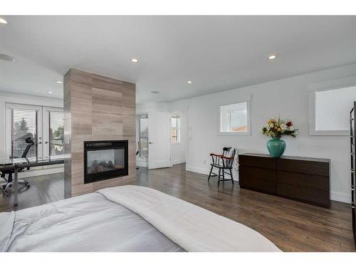 2442 32 Avenue Sw, Calgary, AB - Indoor Photo Showing Living Room With Fireplace