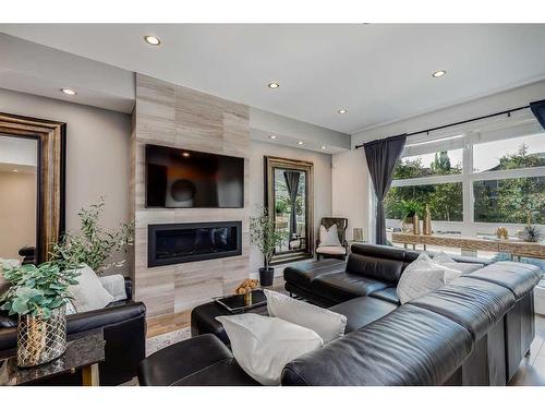 2442 32 Avenue Sw, Calgary, AB - Indoor Photo Showing Living Room With Fireplace