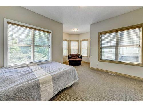 33 Somme Boulevard Sw, Calgary, AB - Indoor Photo Showing Bedroom