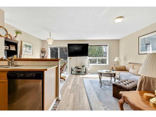 166 Harvest Rose Circle Ne, Calgary, AB - Indoor Photo Showing Living Room With Fireplace