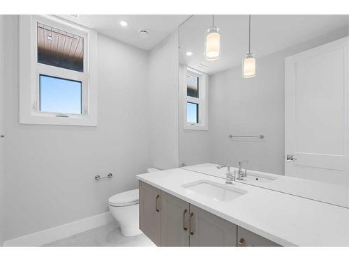 201-180 Marina Cove Se, Calgary, AB - Indoor Photo Showing Bathroom