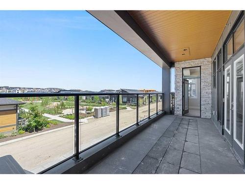 201-180 Marina Cove Se, Calgary, AB - Outdoor With Exterior