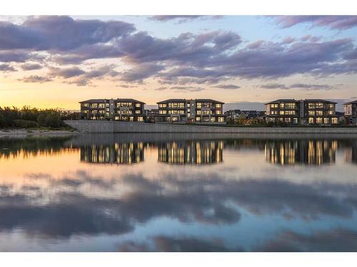 201-180 Marina Cove Se, Calgary, AB - Outdoor With Body Of Water With View