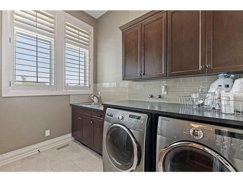 113 Silverado Crest Landing Sw, Calgary, AB - Indoor Photo Showing Laundry Room