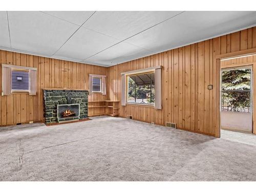 404 Otter Street, Banff, AB - Indoor With Fireplace