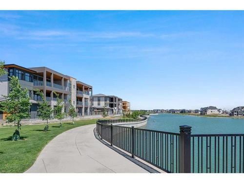 301-180 Marina Cove Se, Calgary, AB - Outdoor With Body Of Water