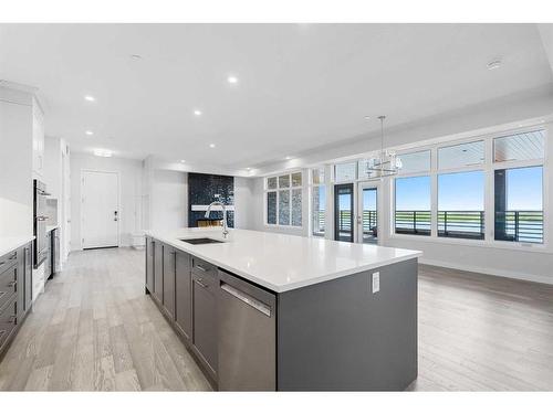 202-180 Marina Cove Se, Calgary, AB - Indoor Photo Showing Kitchen With Upgraded Kitchen