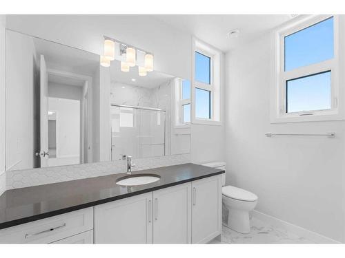 202-180 Marina Cove Se, Calgary, AB - Indoor Photo Showing Bathroom