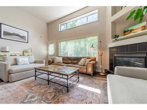 250 Inglewood Grove Se, Calgary, AB - Indoor Photo Showing Living Room With Fireplace