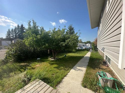 1196 16 Avenue, Didsbury, AB - Outdoor With Deck Patio Veranda