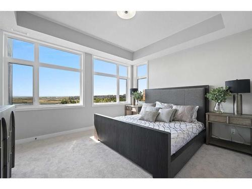 302-180 Marina Cove Se, Calgary, AB - Indoor Photo Showing Bedroom