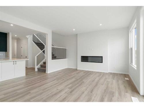 49 Royston Terrace Nw, Calgary, AB - Indoor With Fireplace