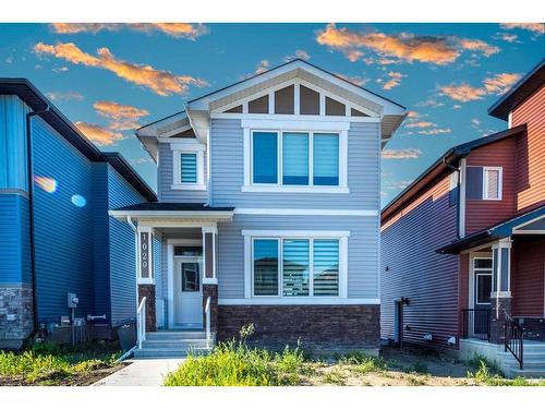 1020 Iron Landing Way, Crossfield, AB - Outdoor With Facade