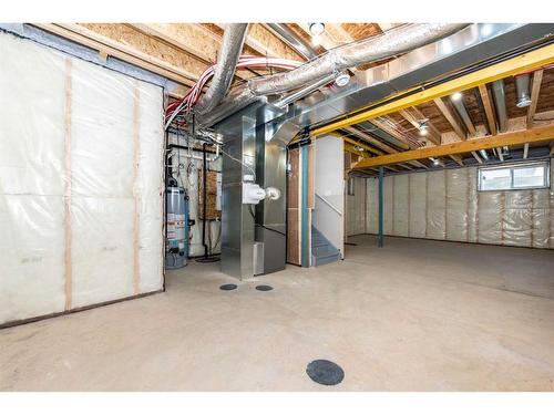 1020 Iron Landing Way, Crossfield, AB - Indoor Photo Showing Basement