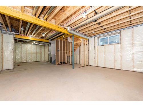 1020 Iron Landing Way, Crossfield, AB - Indoor Photo Showing Basement