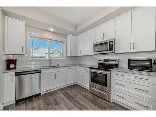 116 Carrington Boulevard Nw, Calgary, AB - Indoor Photo Showing Kitchen