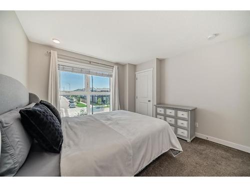 116 Carrington Boulevard Nw, Calgary, AB - Indoor Photo Showing Bedroom