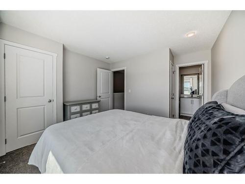 116 Carrington Boulevard Nw, Calgary, AB - Indoor Photo Showing Bedroom