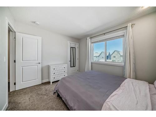 116 Carrington Boulevard Nw, Calgary, AB - Indoor Photo Showing Bedroom