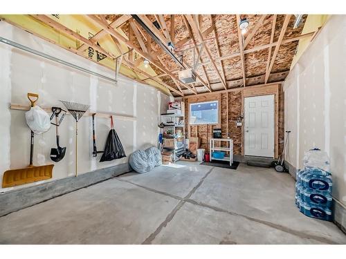 116 Carrington Boulevard Nw, Calgary, AB - Indoor Photo Showing Garage