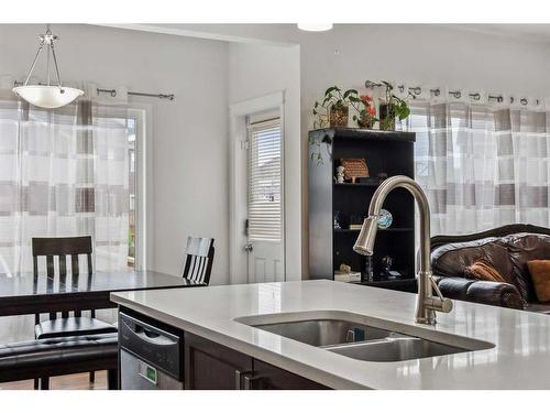 135 Masters Rise Se, Calgary, AB - Indoor Photo Showing Kitchen With Double Sink