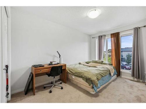 135 Masters Rise Se, Calgary, AB - Indoor Photo Showing Bedroom