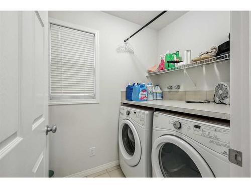 135 Masters Rise Se, Calgary, AB - Indoor Photo Showing Laundry Room