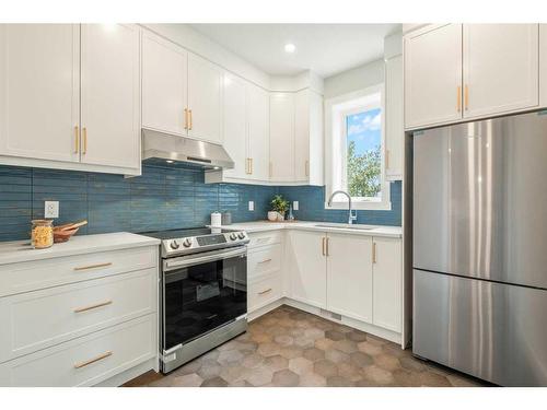 49 Rockhaven Green Nw, Calgary, AB - Indoor Photo Showing Kitchen With Stainless Steel Kitchen With Upgraded Kitchen