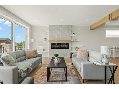 49 Rockhaven Green Nw, Calgary, AB - Indoor Photo Showing Living Room With Fireplace