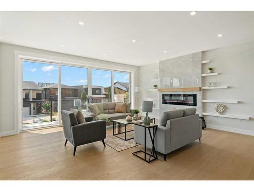 49 Rockhaven Green Nw, Calgary, AB - Indoor Photo Showing Living Room With Fireplace