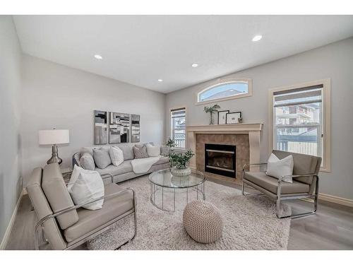 15 Saddleland Drive Ne, Calgary, AB - Indoor Photo Showing Living Room With Fireplace