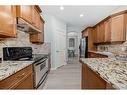 15 Saddleland Drive Ne, Calgary, AB  - Indoor Photo Showing Kitchen 