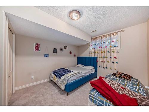 15 Saddleland Drive Ne, Calgary, AB - Indoor Photo Showing Bedroom