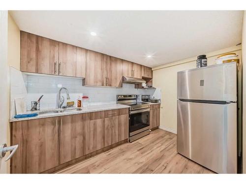 15 Saddleland Drive Ne, Calgary, AB - Indoor Photo Showing Kitchen With Stainless Steel Kitchen