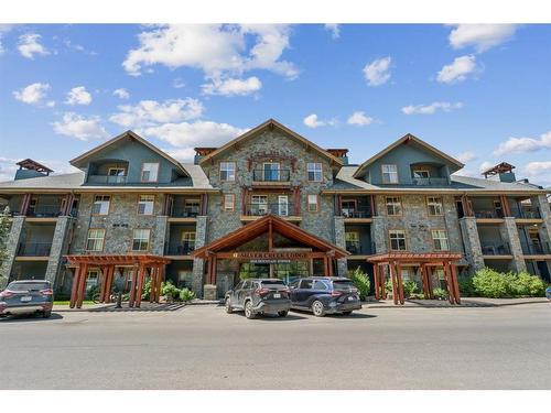 303-1818 Mountain Avenue, Canmore, AB - Outdoor With Facade