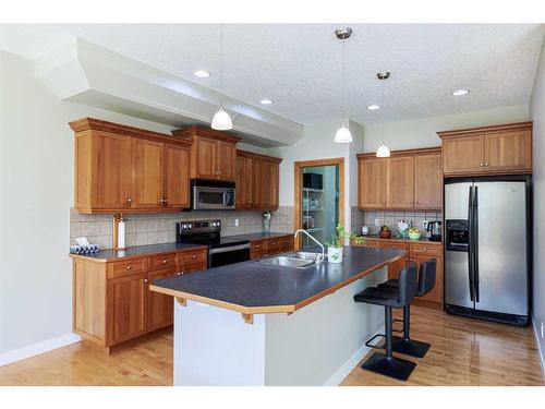 68 Tuscany Glen Road Nw, Calgary, AB - Indoor Photo Showing Kitchen With Stainless Steel Kitchen With Double Sink