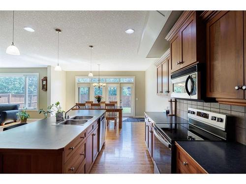 68 Tuscany Glen Road Nw, Calgary, AB - Indoor Photo Showing Kitchen With Double Sink