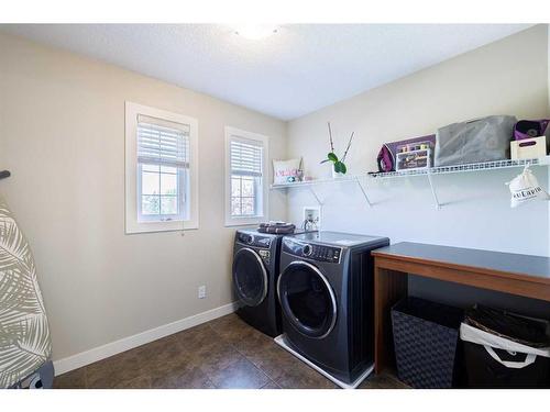 68 Tuscany Glen Road Nw, Calgary, AB - Indoor Photo Showing Laundry Room