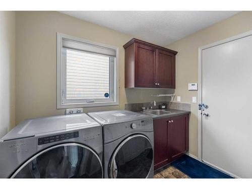 128 Tuscany Ravine Terrace Nw, Calgary, AB - Indoor Photo Showing Laundry Room