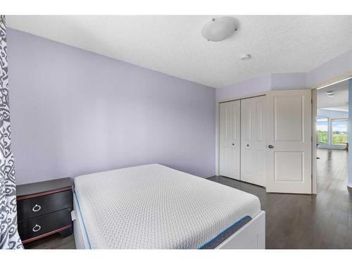 128 Tuscany Ravine Terrace Nw, Calgary, AB - Indoor Photo Showing Bedroom