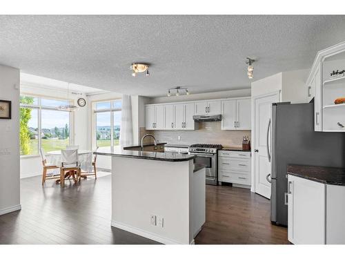 128 Tuscany Ravine Terrace Nw, Calgary, AB - Indoor Photo Showing Kitchen With Stainless Steel Kitchen