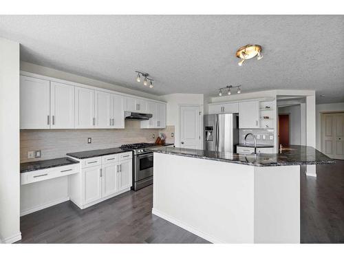 128 Tuscany Ravine Terrace Nw, Calgary, AB - Indoor Photo Showing Kitchen With Stainless Steel Kitchen With Upgraded Kitchen