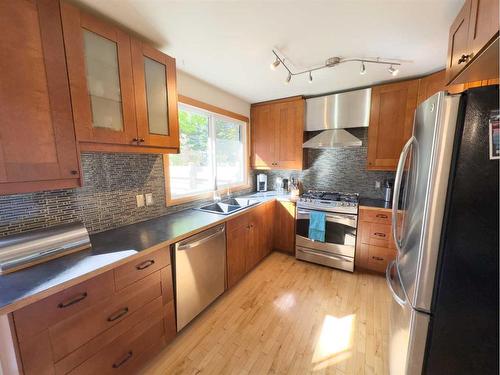 236 Kluane Street, Banff, AB - Indoor Photo Showing Kitchen With Double Sink