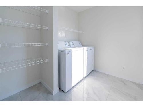 20 Corner Glen Road Ne, Calgary, AB - Indoor Photo Showing Laundry Room