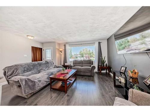 249 Acadia Drive Se, Calgary, AB - Indoor Photo Showing Living Room