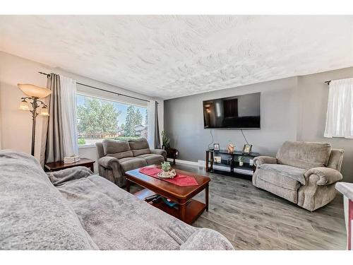 249 Acadia Drive Se, Calgary, AB - Indoor Photo Showing Living Room