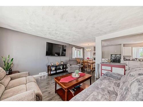 249 Acadia Drive Se, Calgary, AB - Indoor Photo Showing Living Room