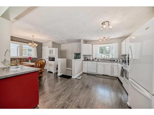 249 Acadia Drive Se, Calgary, AB - Indoor Photo Showing Kitchen With Double Sink