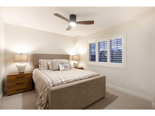 1149 Coopers Drive Sw, Airdrie, AB - Indoor Photo Showing Bedroom